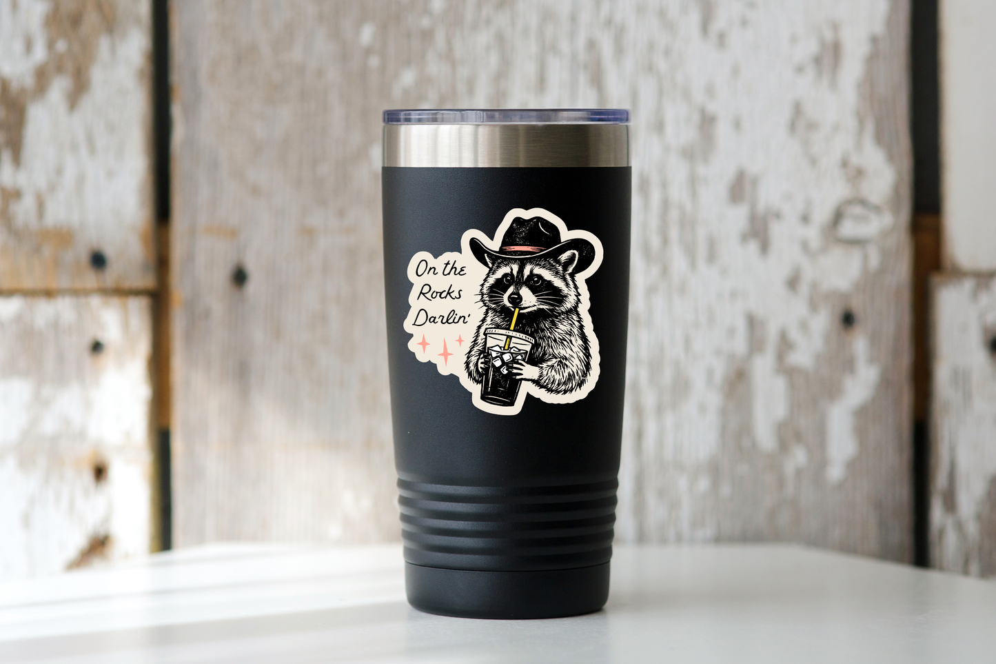 On the Rocks Darlin' Sticker - iced coffee, raccoon, cowboy